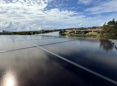Rooftop solar overlooking a Gold Coast waterway