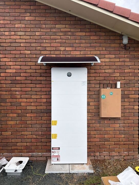 Switchboard on brick exterior